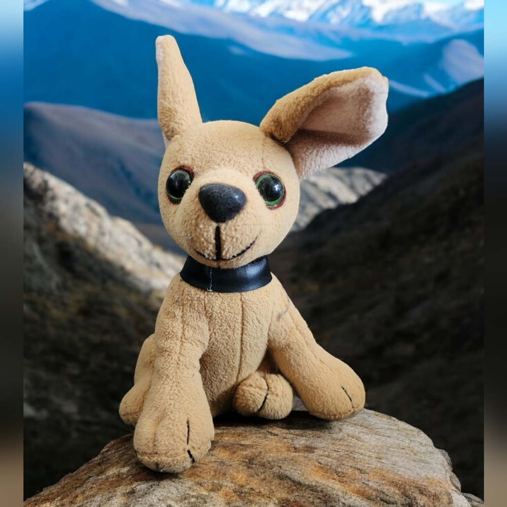 Vintage Taco Bell Chihuahua plushie. Talks. Still works.